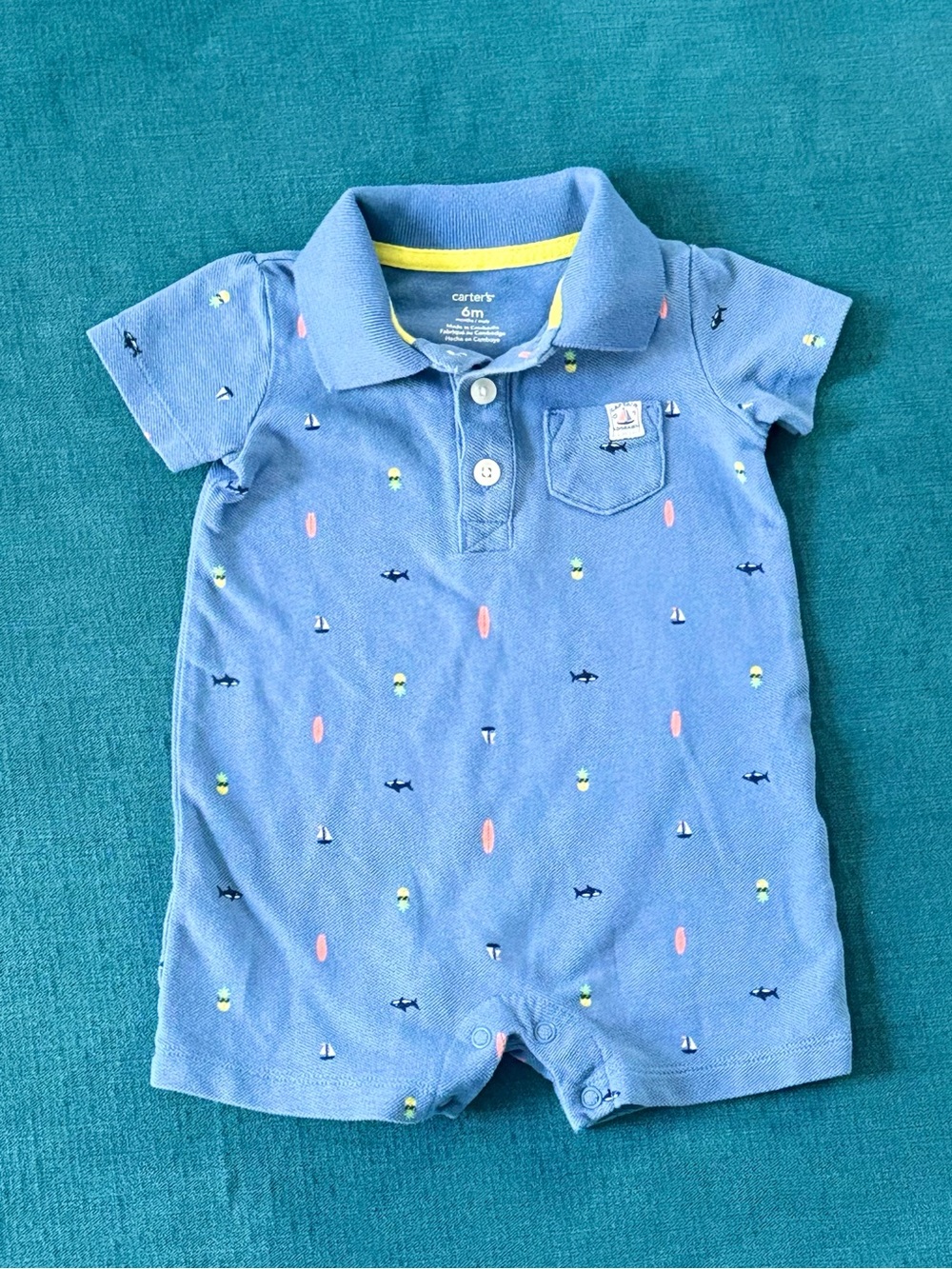Carter's Blue Polo Romper with Subtle Nautical Pattern, Buttons, and Snaps 6M